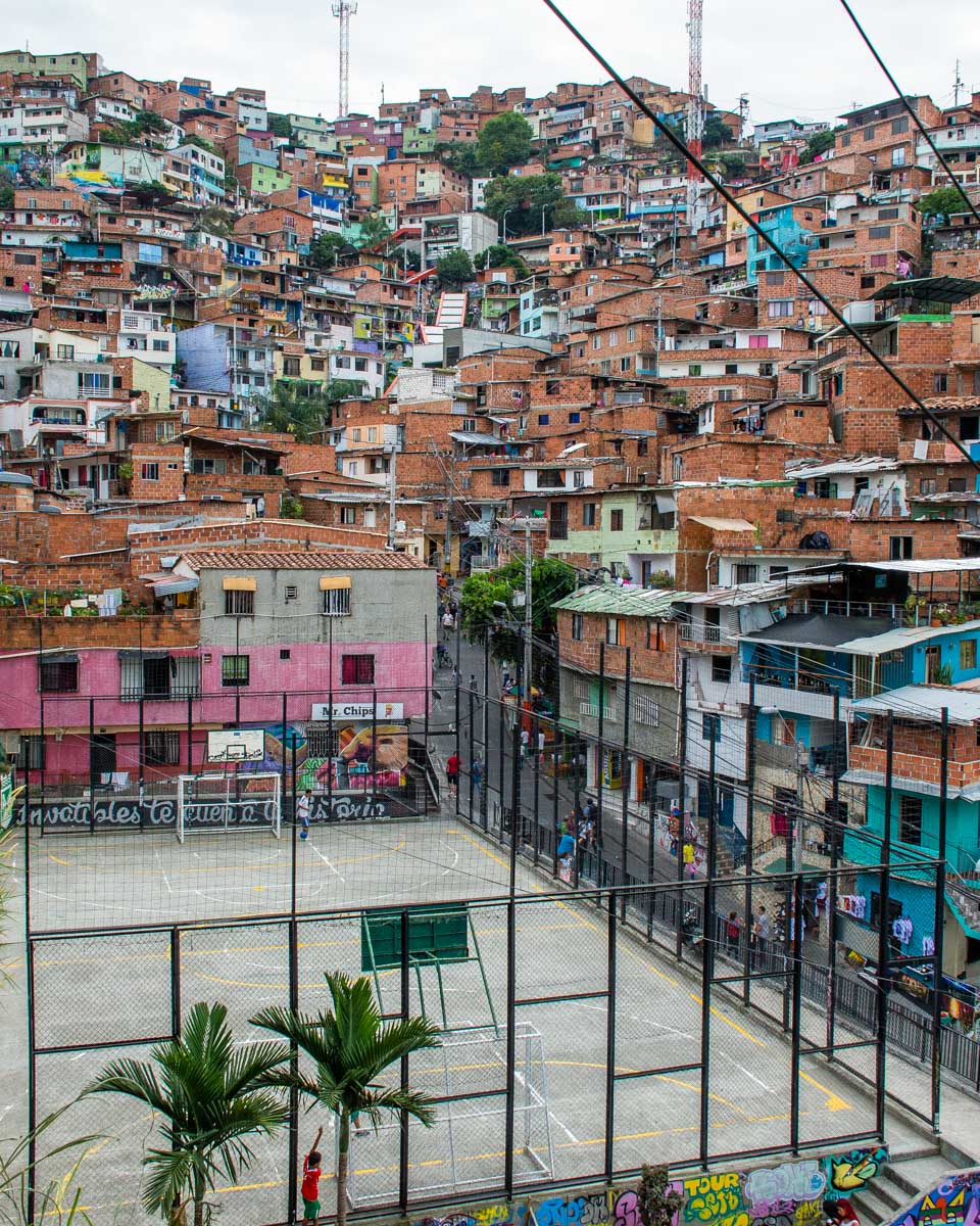 A basketball court and houses in Comuna 13, Medellin