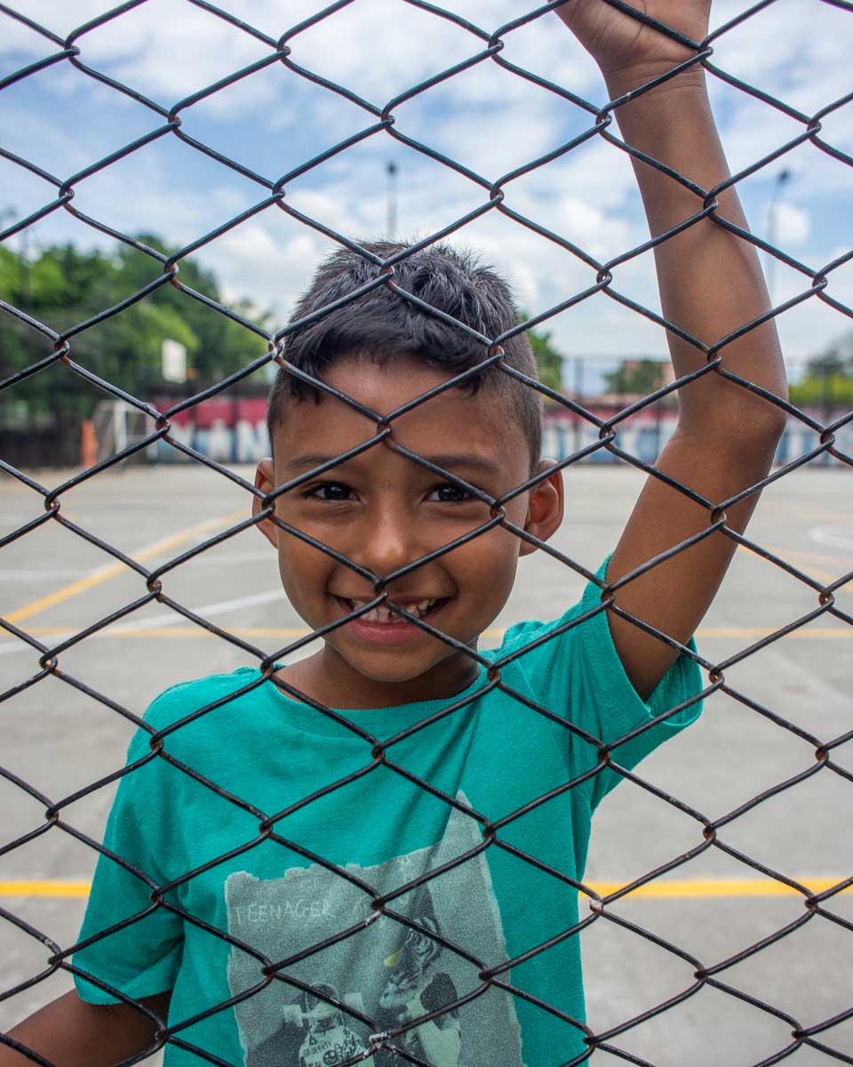 A boy poses for a photo in Comuna 13, Medellin