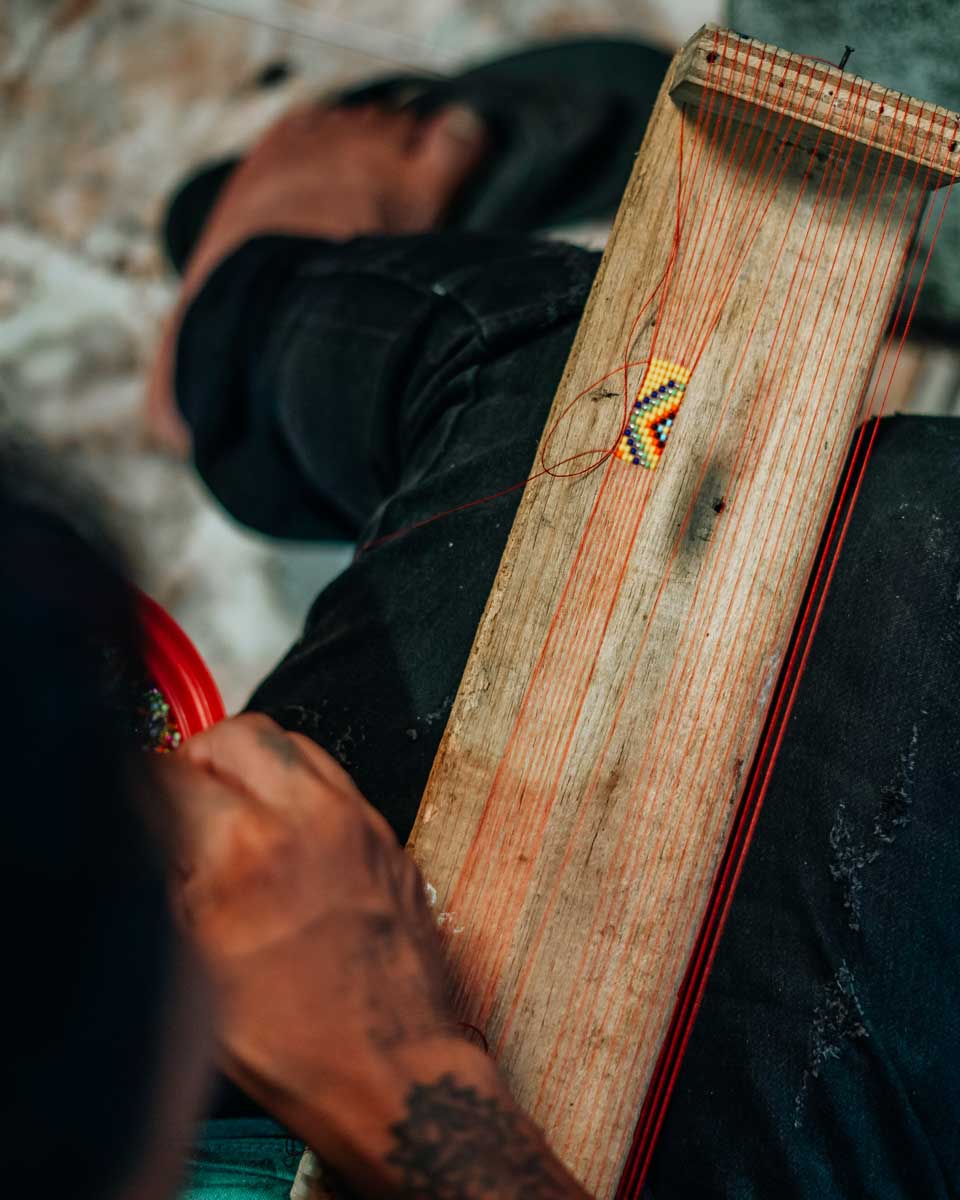 A person creates art at Embera Indigenous VillageÂ
