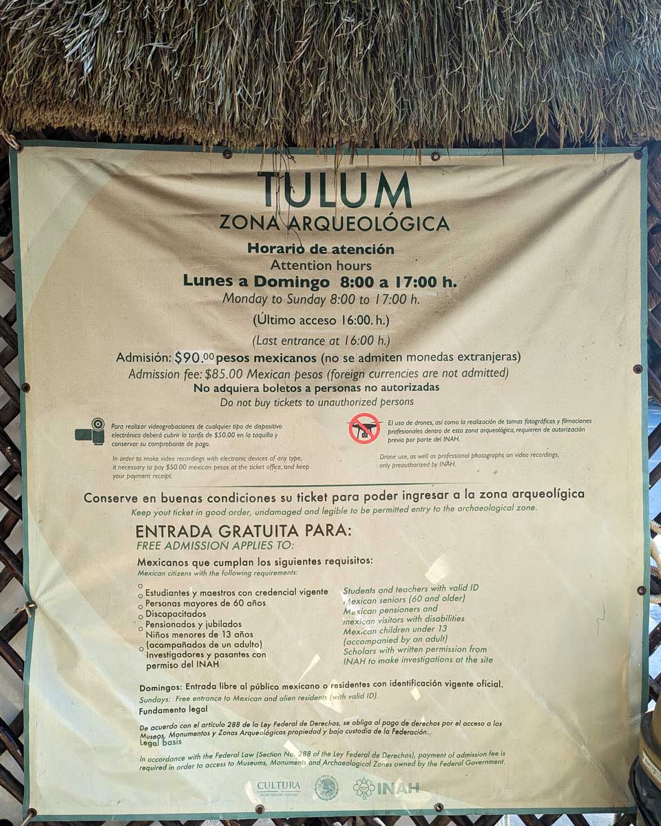 A signe of the entrance fees and rules to enter the Tulum Ruins