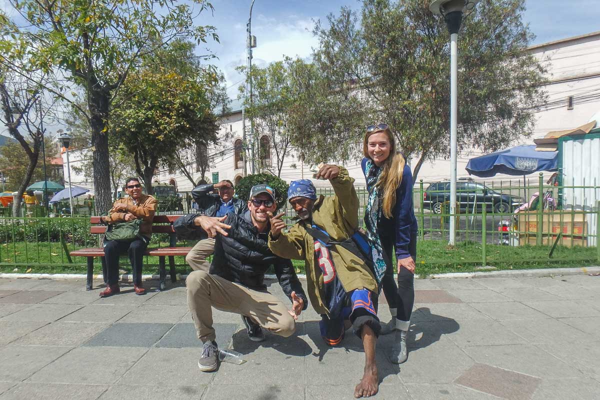Bailey and Daniel pose for a photo with Crazy Dave in La Paz, Bolivia