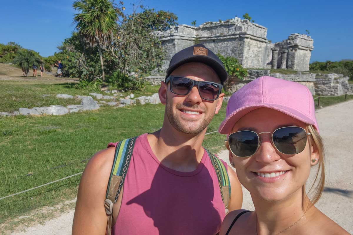 Bailey and Daniel take a selfie at the Tulum Ruins in Tulum, Mexico