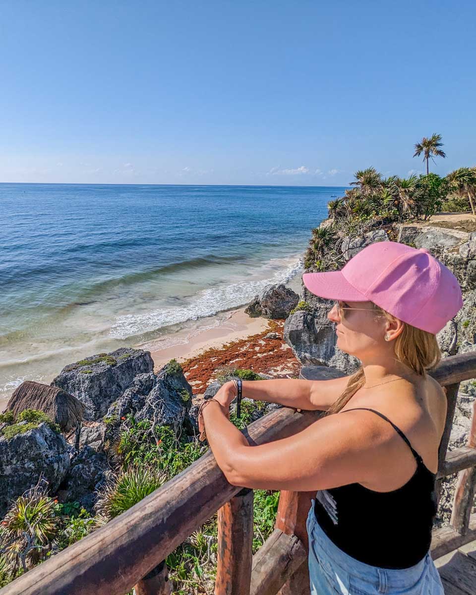 Bailey looks out at the ocean at the Tulum Ruins in Mexico