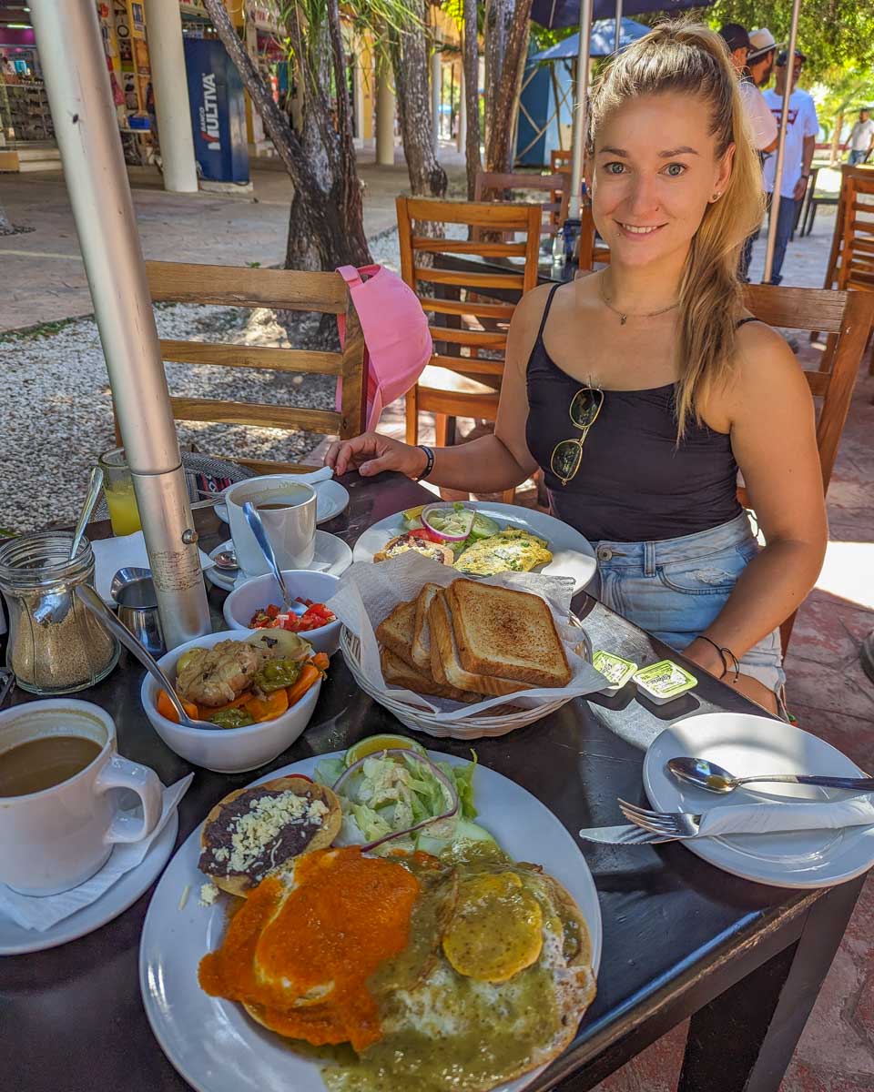 Bailey with breakfast at Don Cafeto Tulum Ruinas