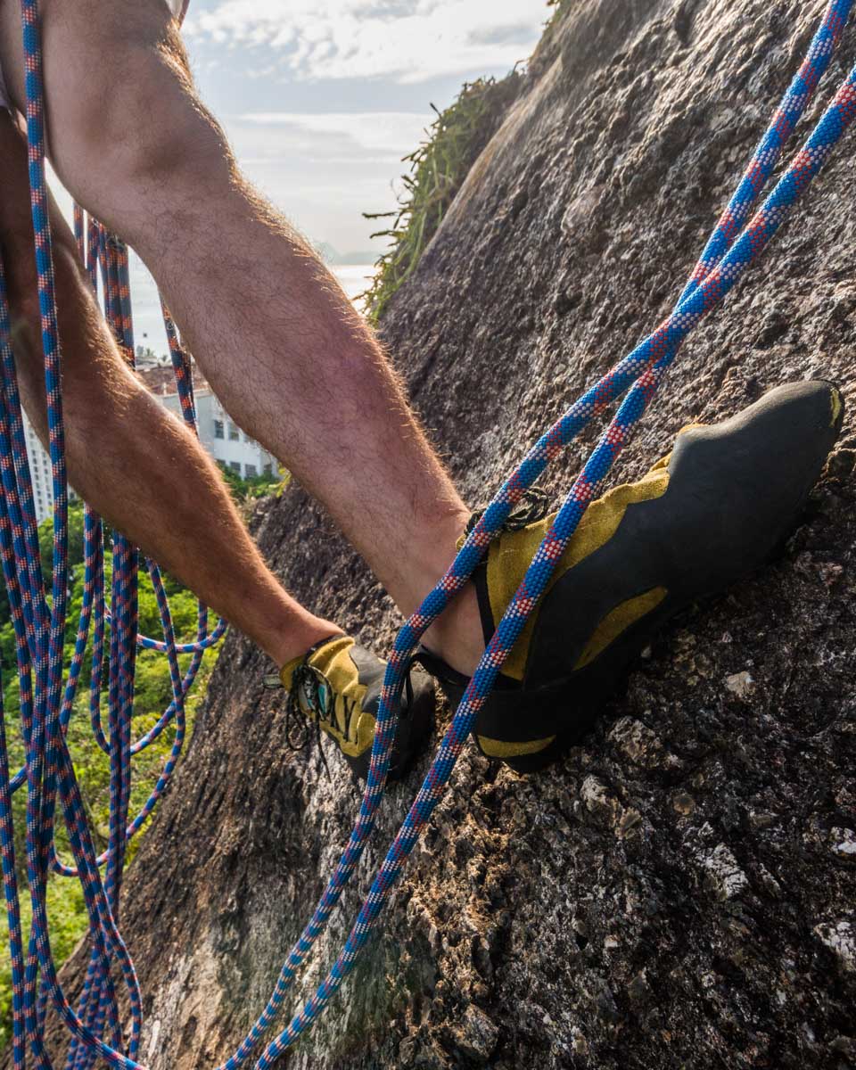 Close up of a rock climber on Sugarloaf Mountain (Pão de Açúcar) in Rio De Janeiro, Brazil