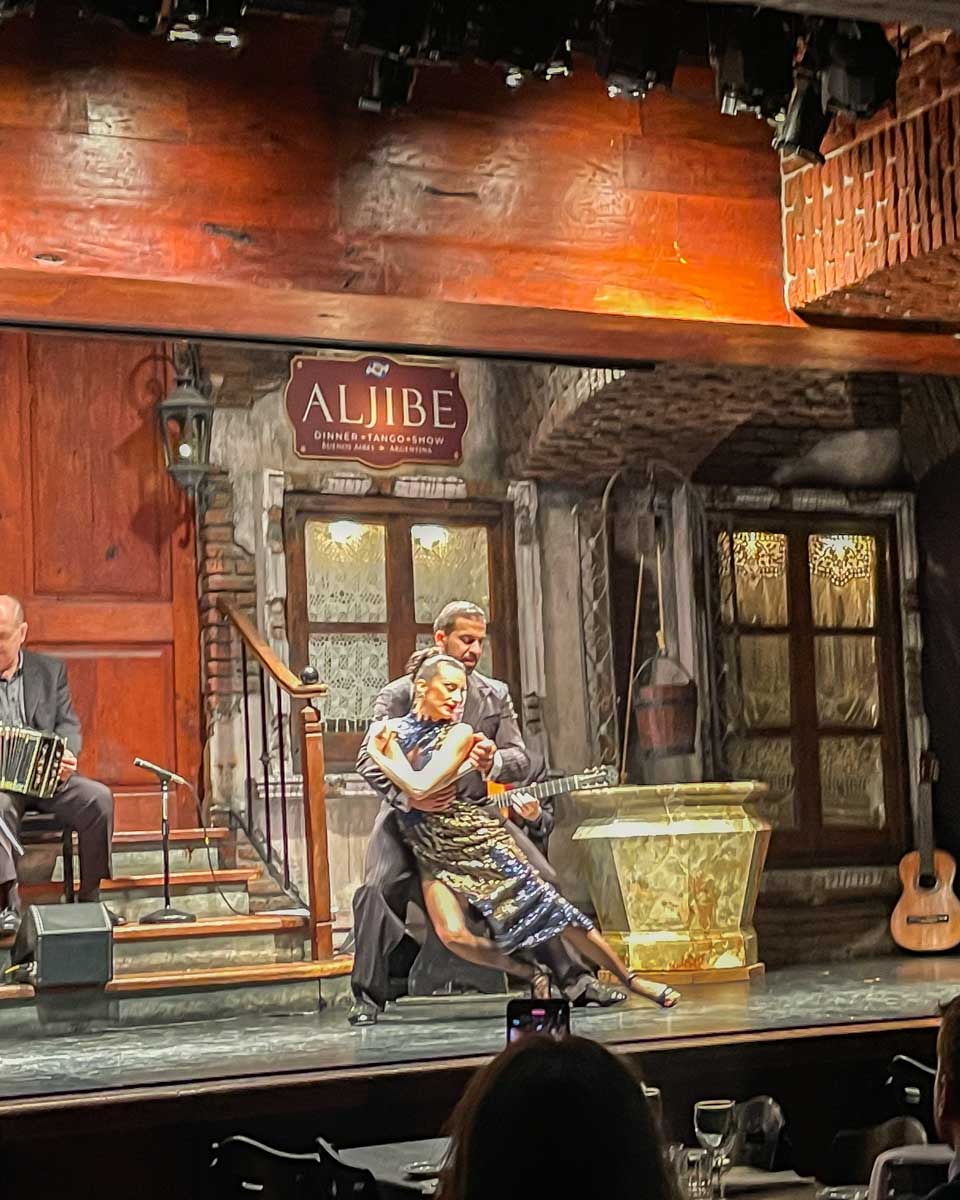 Dancers on stage at a tango show in BA