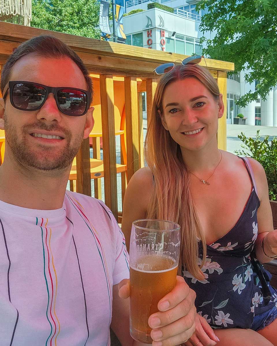 Enjoying a beer at Off the Rail Brewing in Vancouver, Canada