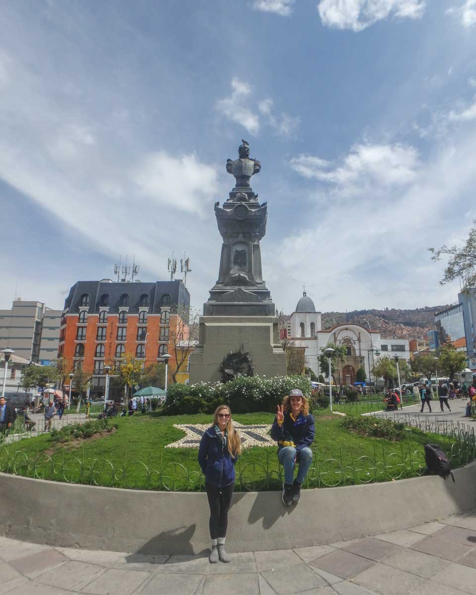 Relaxing in a main square during a walking tour in La Paz, Bolivia