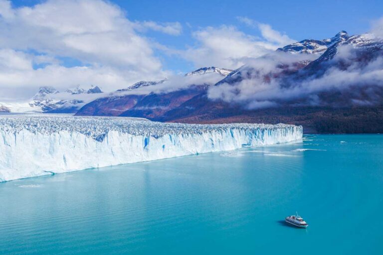 A boat appraoches Perit Moreno Glacier as seen from the viewing platform near El Calafate, Argentina