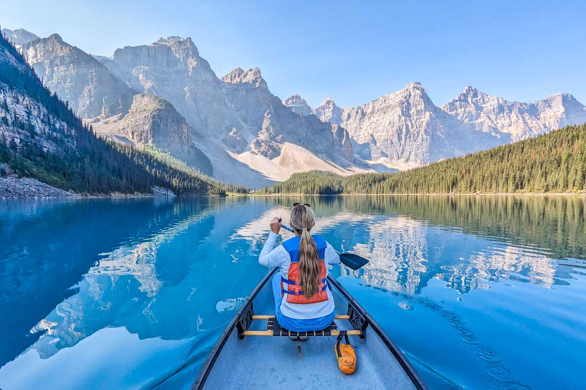 Bailey canoes on Moraine Lake with stunning reflections