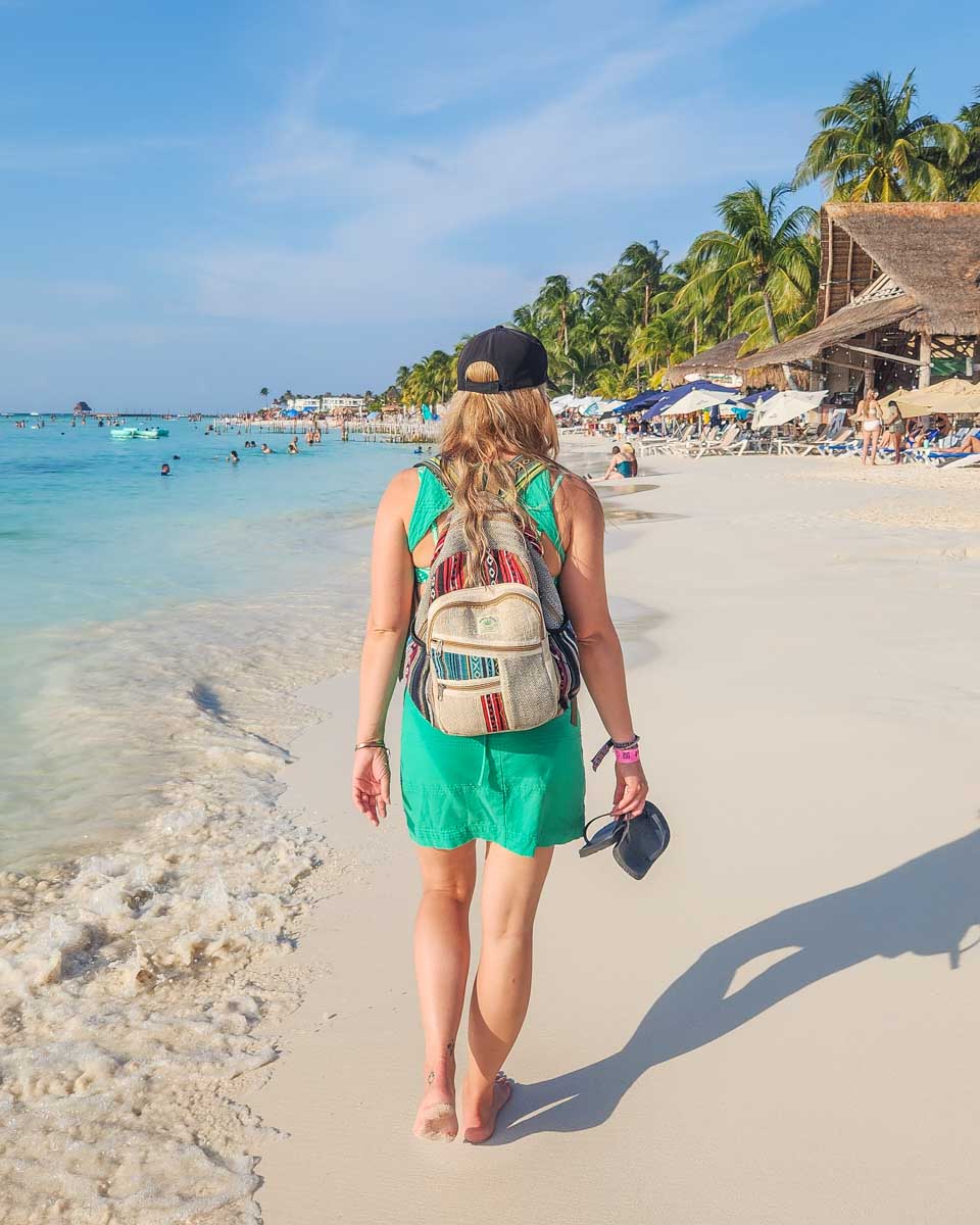 Bailey walks along Playa Centro on Isla Mujeres, Mexico