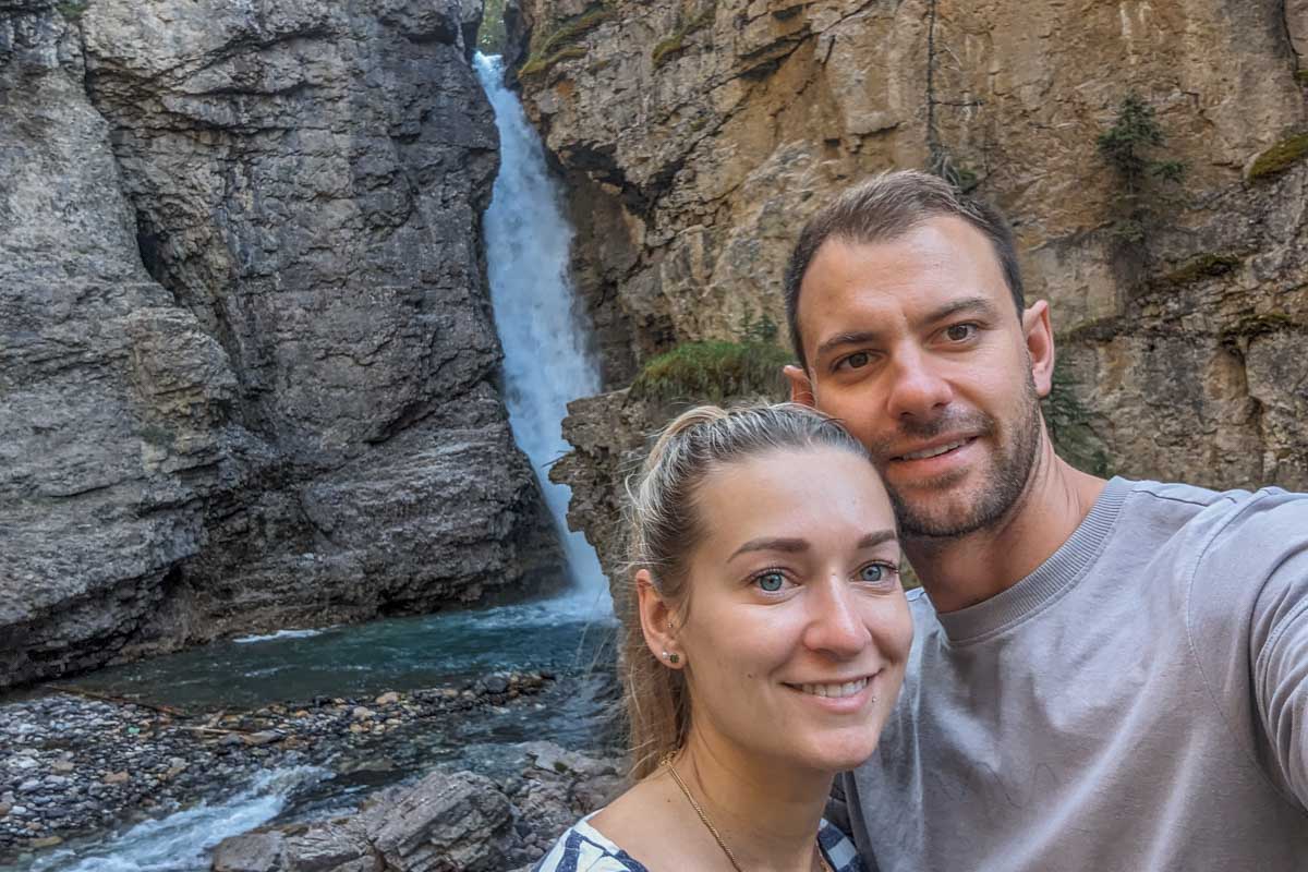 Daniel and Bailey take a selfie at Upper Falls at Johnston Canyon in Banff National Park