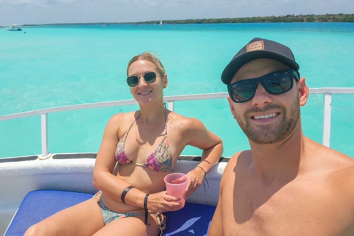 Daniel and Bailey take a selfie on their Bacalar boat tour in Mexico