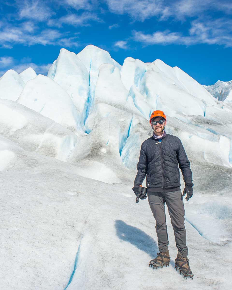 Daniel poses for a photo on the Perito Moreno Glacier on a glacier trekking tour
