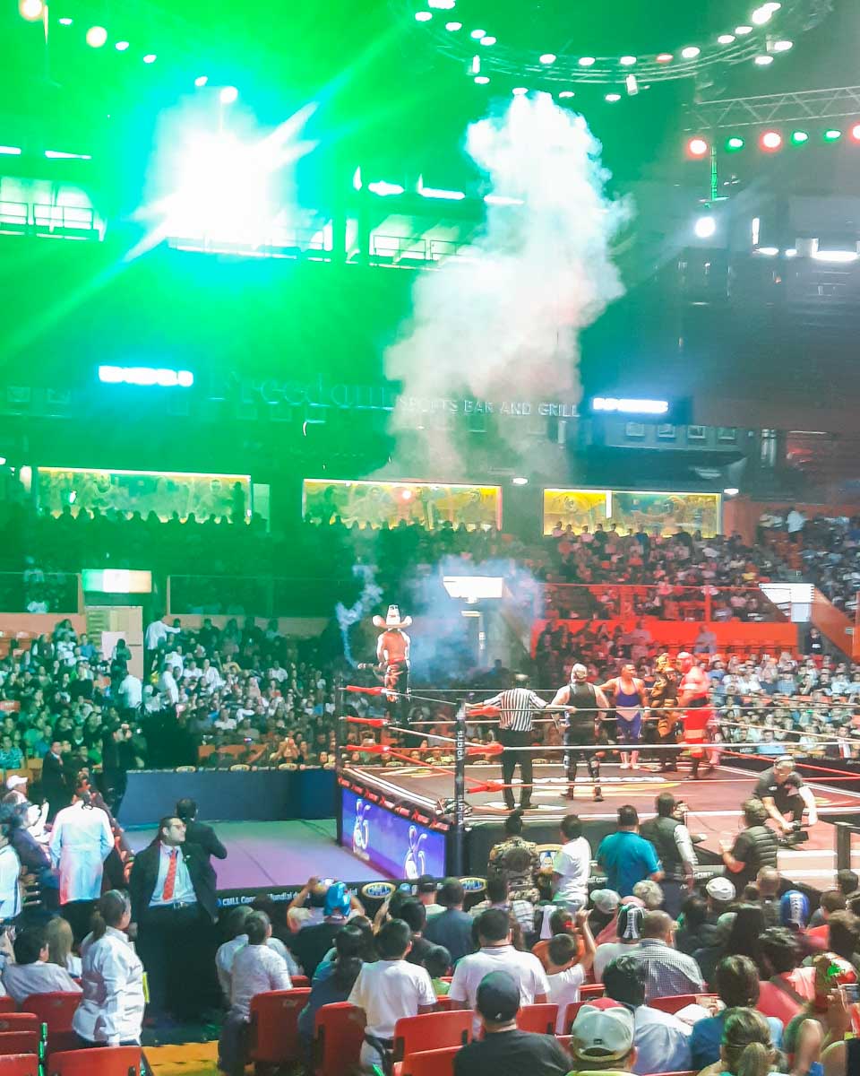 Smoke shoots up during a Lucha Libre show in Mexico City, Mexico