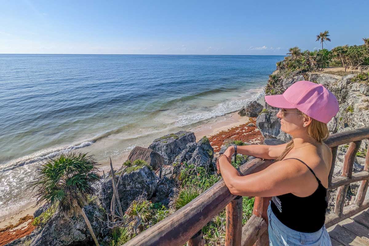 Bailey looks out over the beach at the Tulum Ruins, Mexico