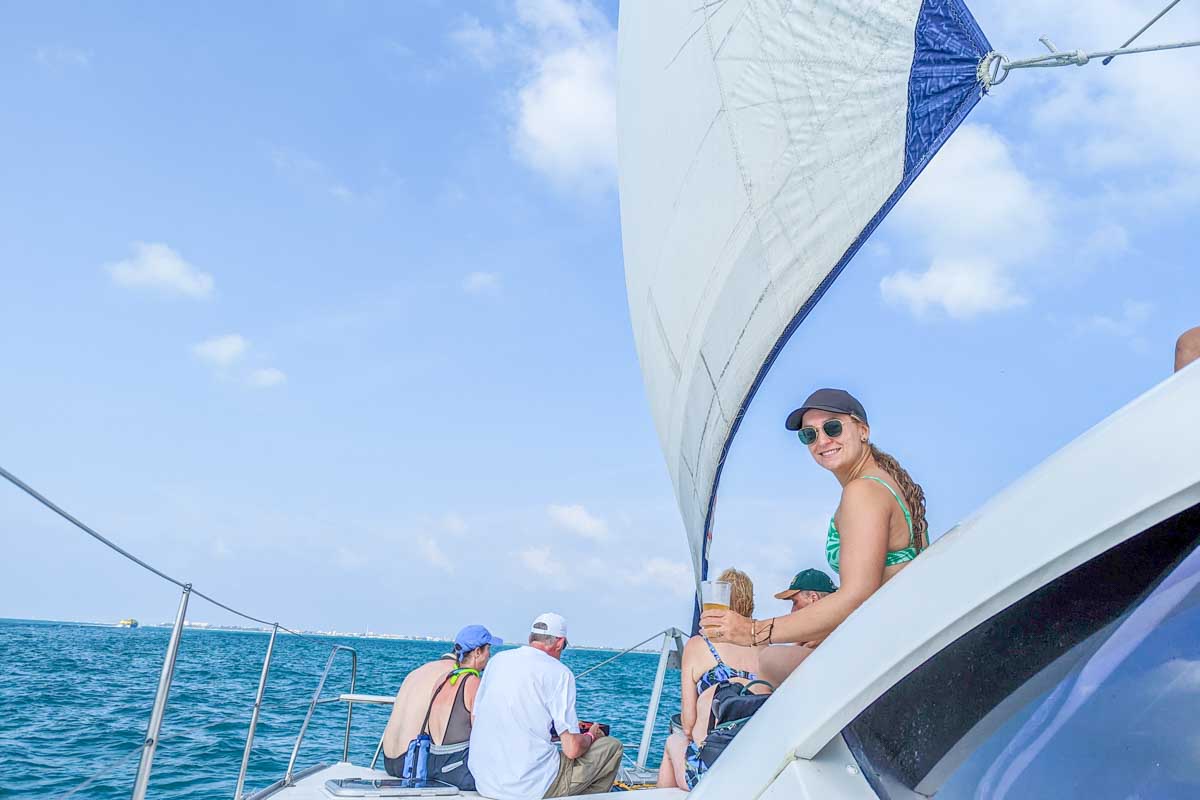 Bailey poses for a photo on a catamran in Cancun, mexico