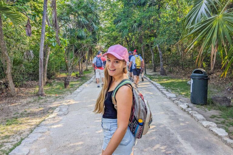 Bailey smiles at the camera while walking around Tulum, Mexico