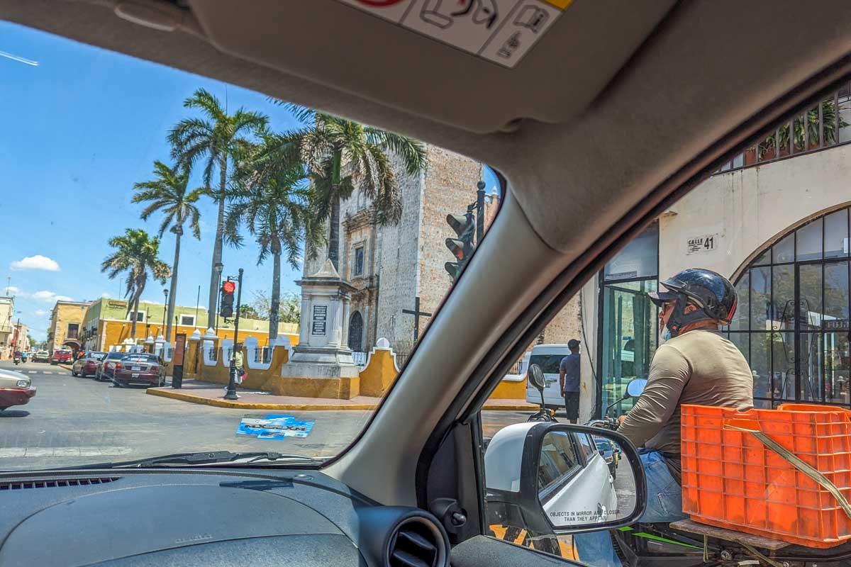 Photo out the windscreen in Mexico while diving a rental car