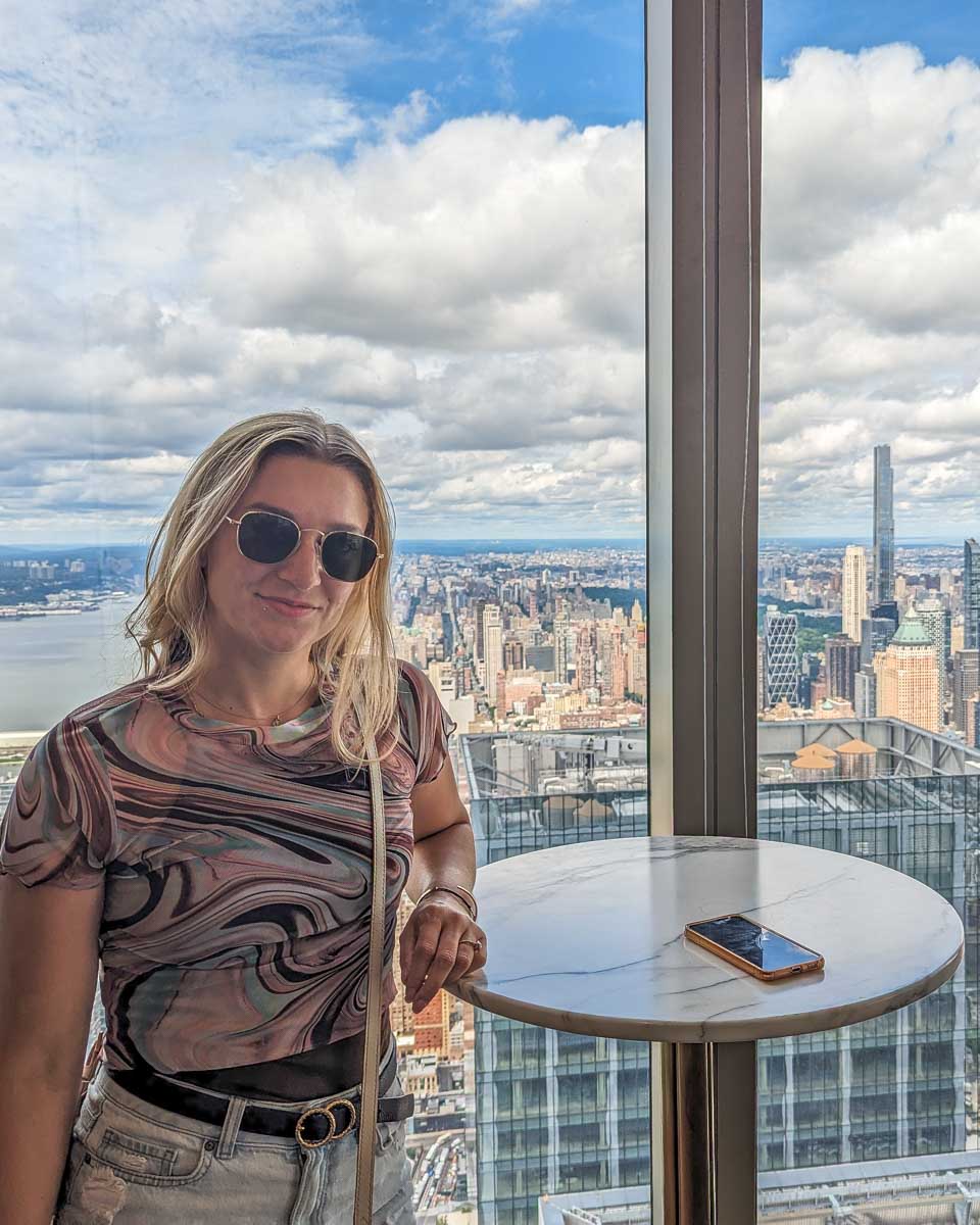 Bailey at a table inside the Edge NYC