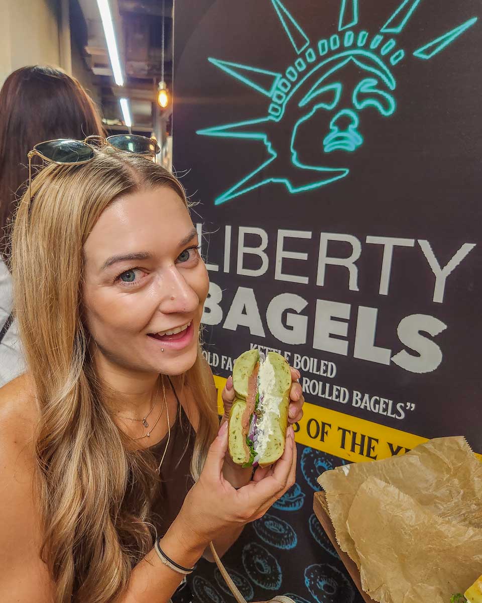 Bailey eats a Bagel from Liberty Bagels in New York City