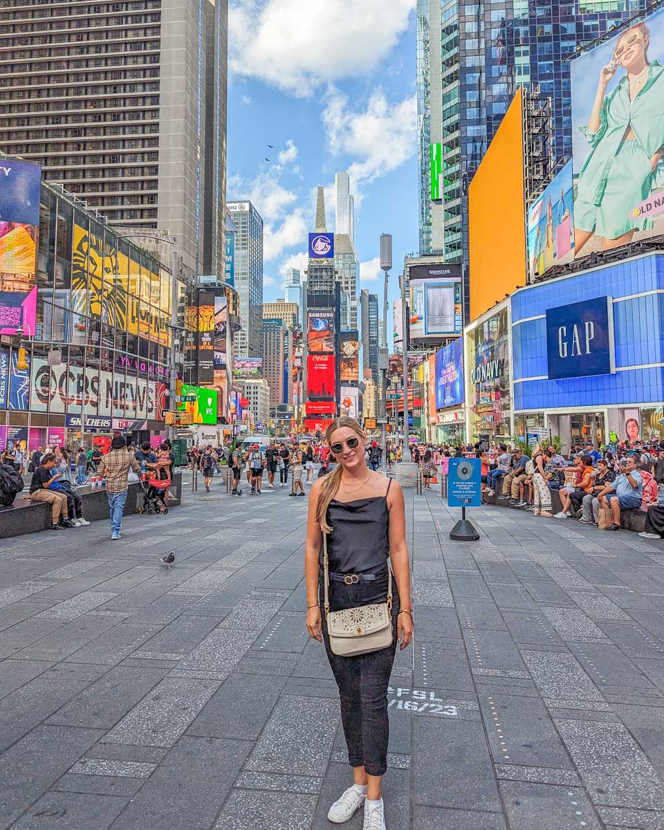 Bailey poses for a photo at Times Square in New York City