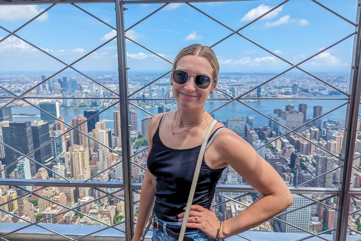 Bailey poses for a photo at the top of the Empire State Building in New York City