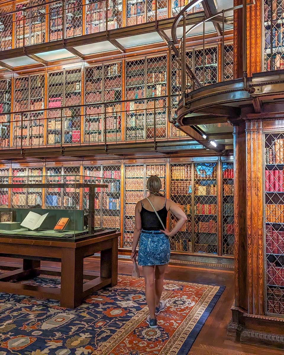 Bailey walks the library inside the Morgan Library in NYC