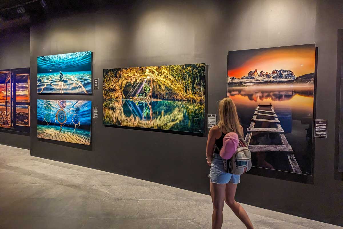 Bailey walks the photo gallery at Mystika Immersive, Tulum