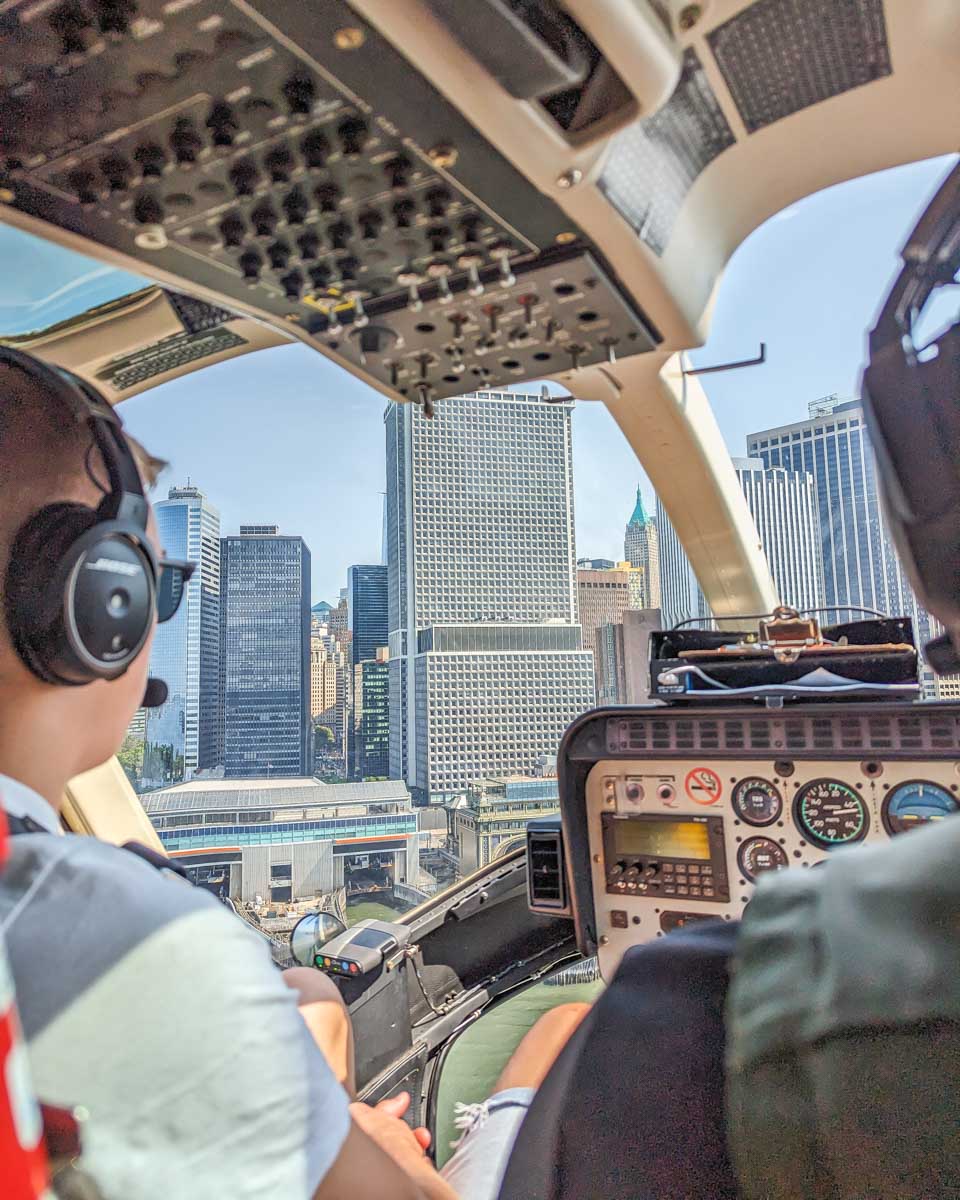 View from the front window of a helicopter coming into land in New York City