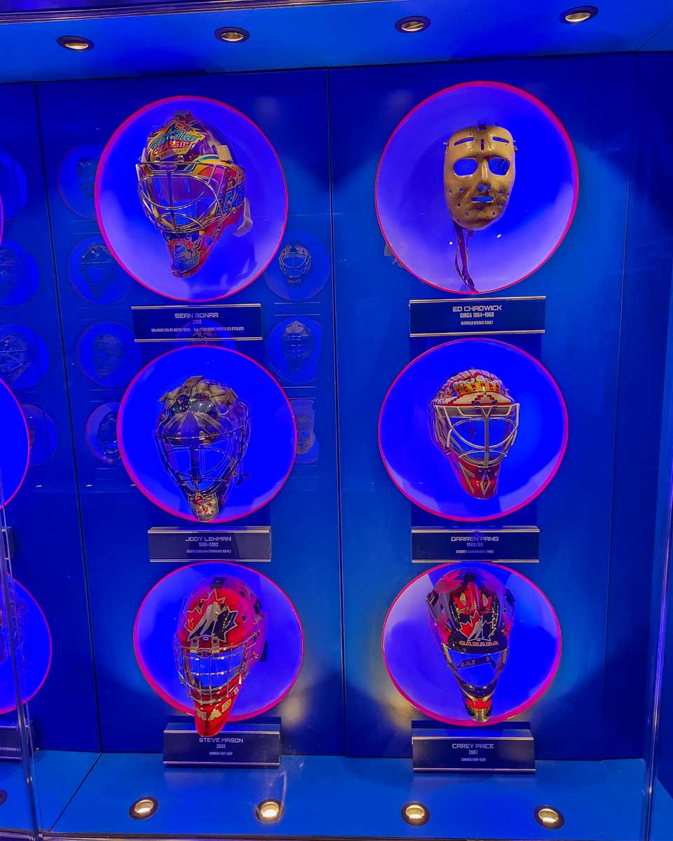 A group of masks inside the Hockey Hall of Fame