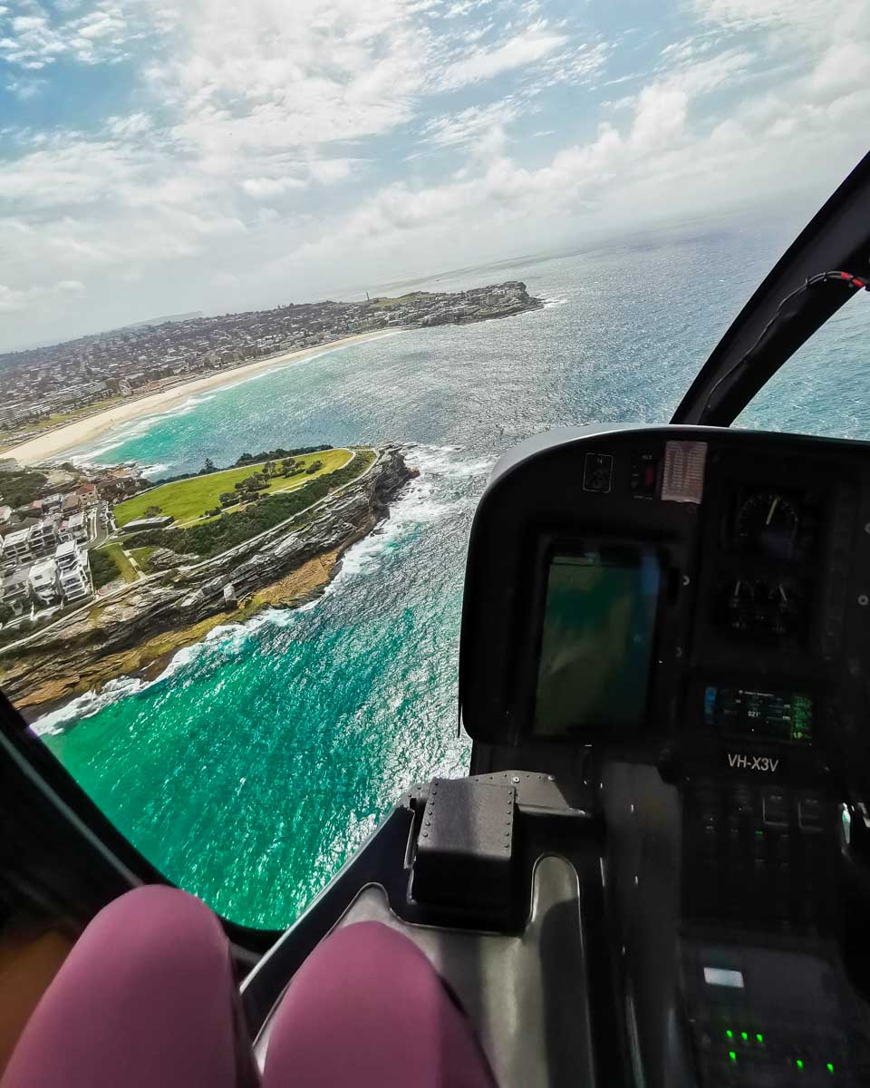Flying over the coast of Sydney, Australia on a tour