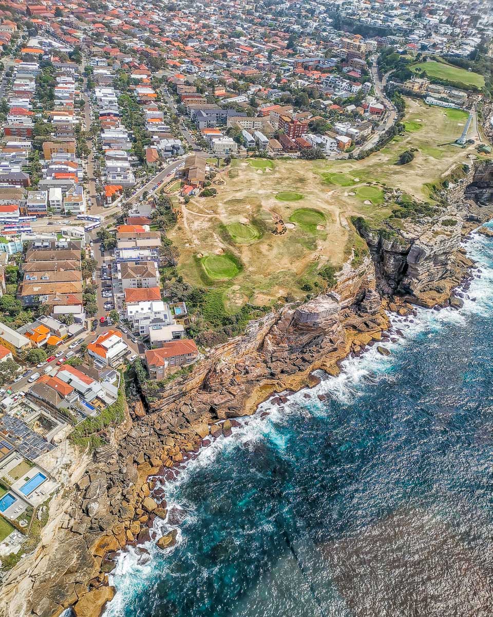 Sydney Eastern coastline of rocky cliffs as seen from a helicopter tour