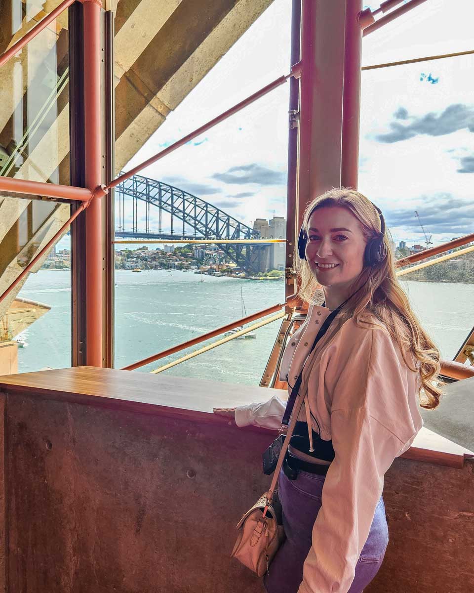 Bailey enjoys the view of the Sydney Harbour Bridge inside the Sydney Opera House on a tour