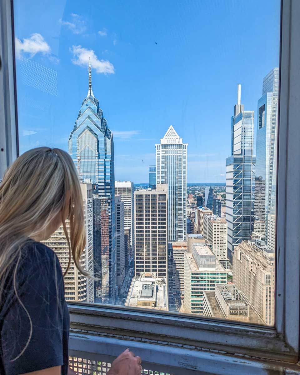 Bailey looks out the window of City Hall Tower in Philadelphia