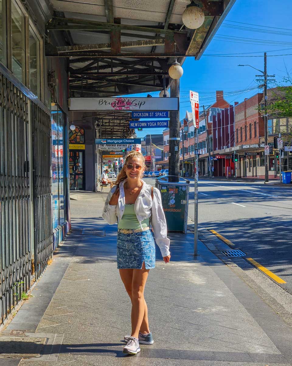 Bailey poses for a photo in Sydney while on a walking tour