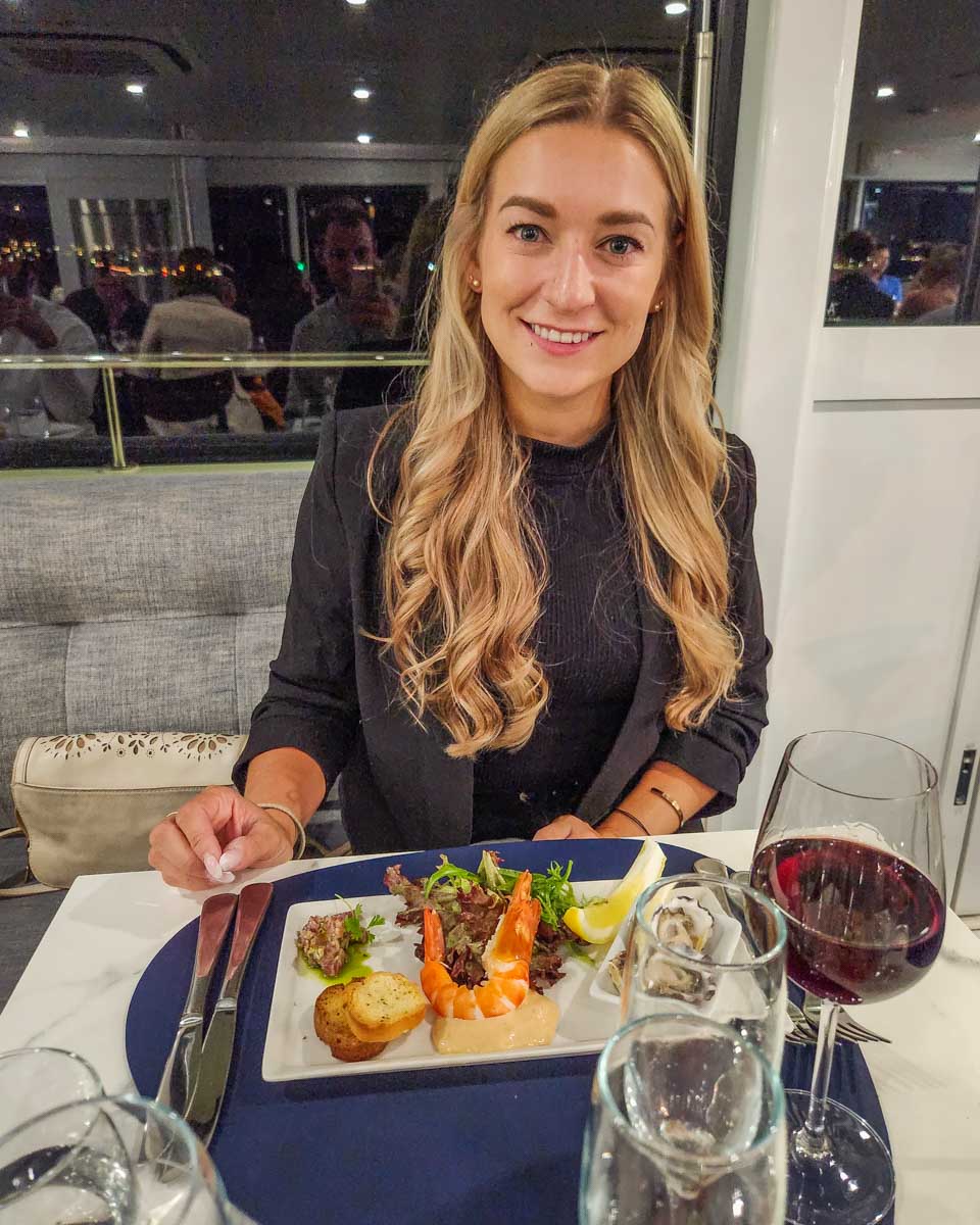 Bailey sits down with her started on the Journey Beyond Cruise Dinner in Sydney Harbour