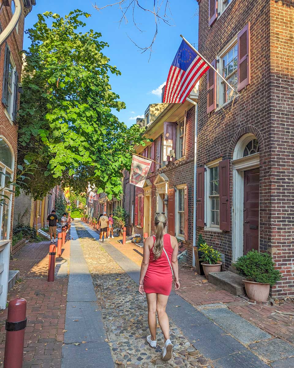 Bailey walks through Elfreth's Alley and Museum in Philadelphia, USA