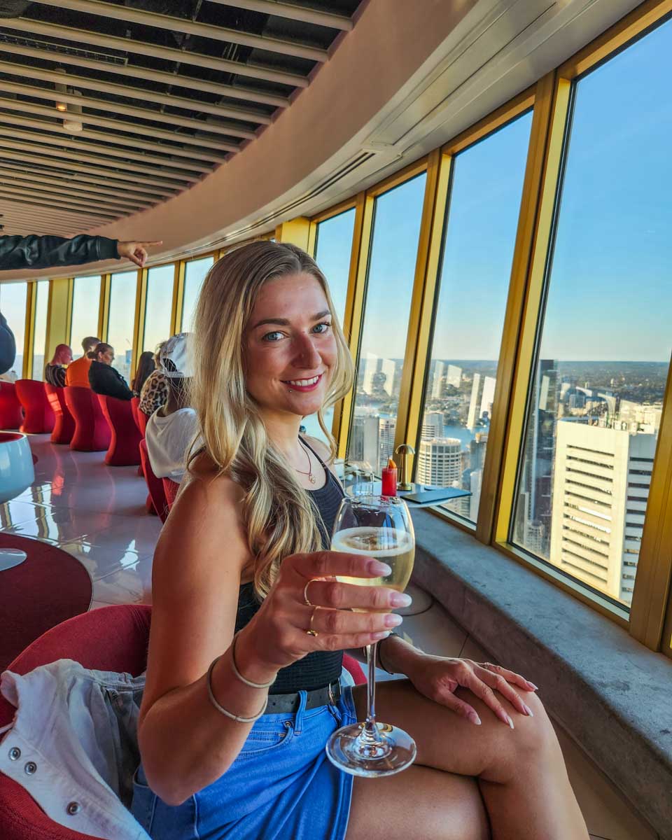 Bailey with a glass of wine at Bar 83 Sydney Eye Tower