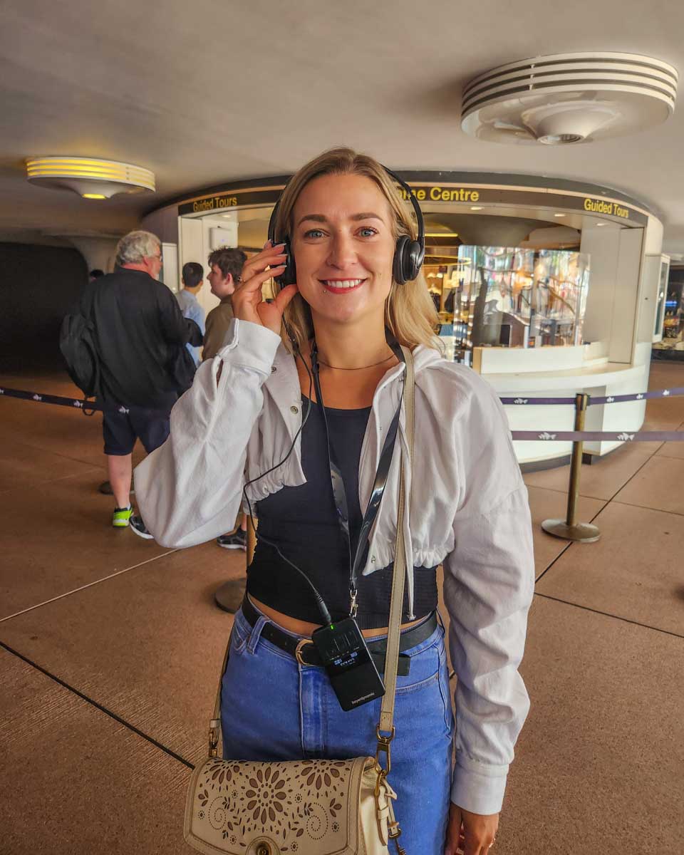 Bailey with her headphones on about to do a tour of the Sydney Opera House