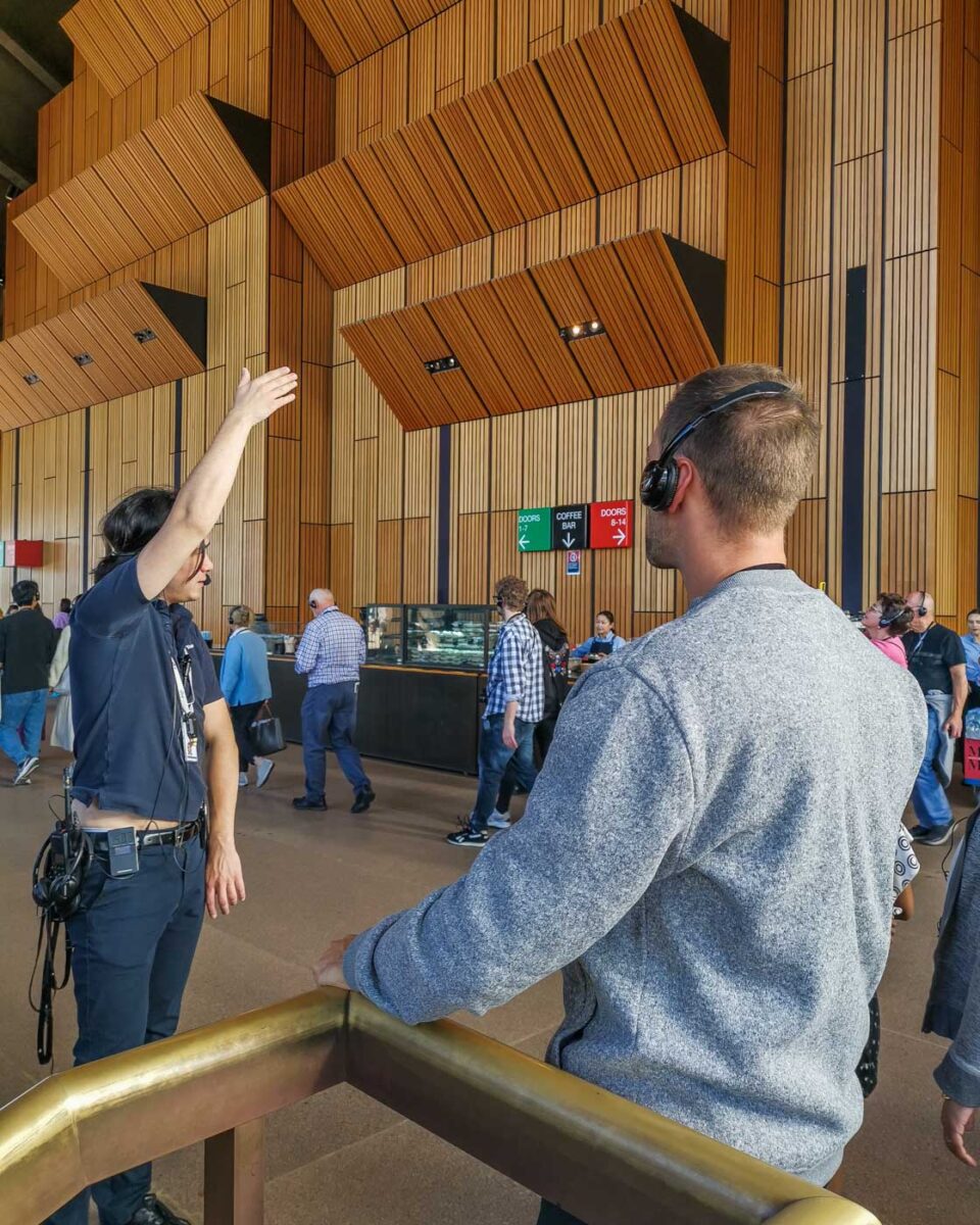Daniel listens to our guide inside the Sydney opera House