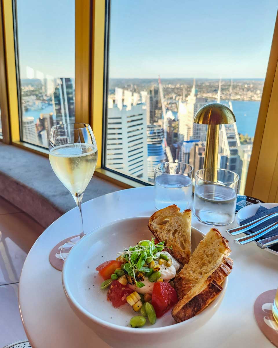 Food and drinks at a window seat at Bar 83 at Sydney Tower
