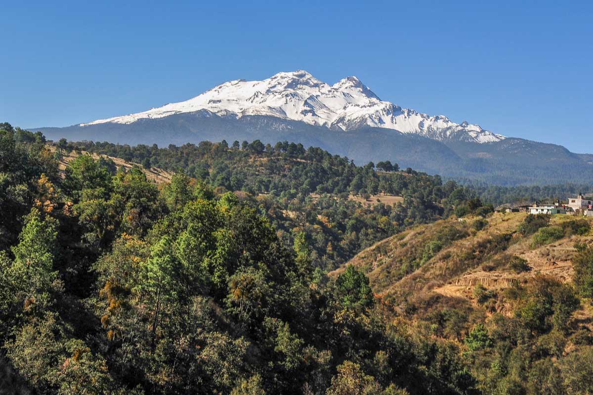 Iztaccihuatl Volcano in the distance
