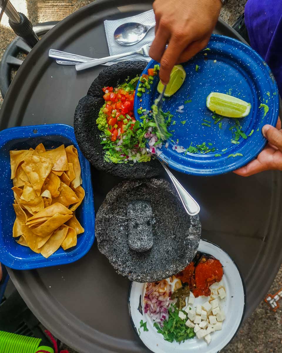 Making fresh guacamole on a food tour in Puerto Vallarta, Mexico (2)