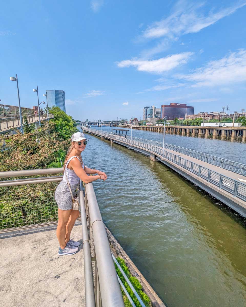 bailey enjoys the views of the river along Schuylkill Banks in Philadelphia