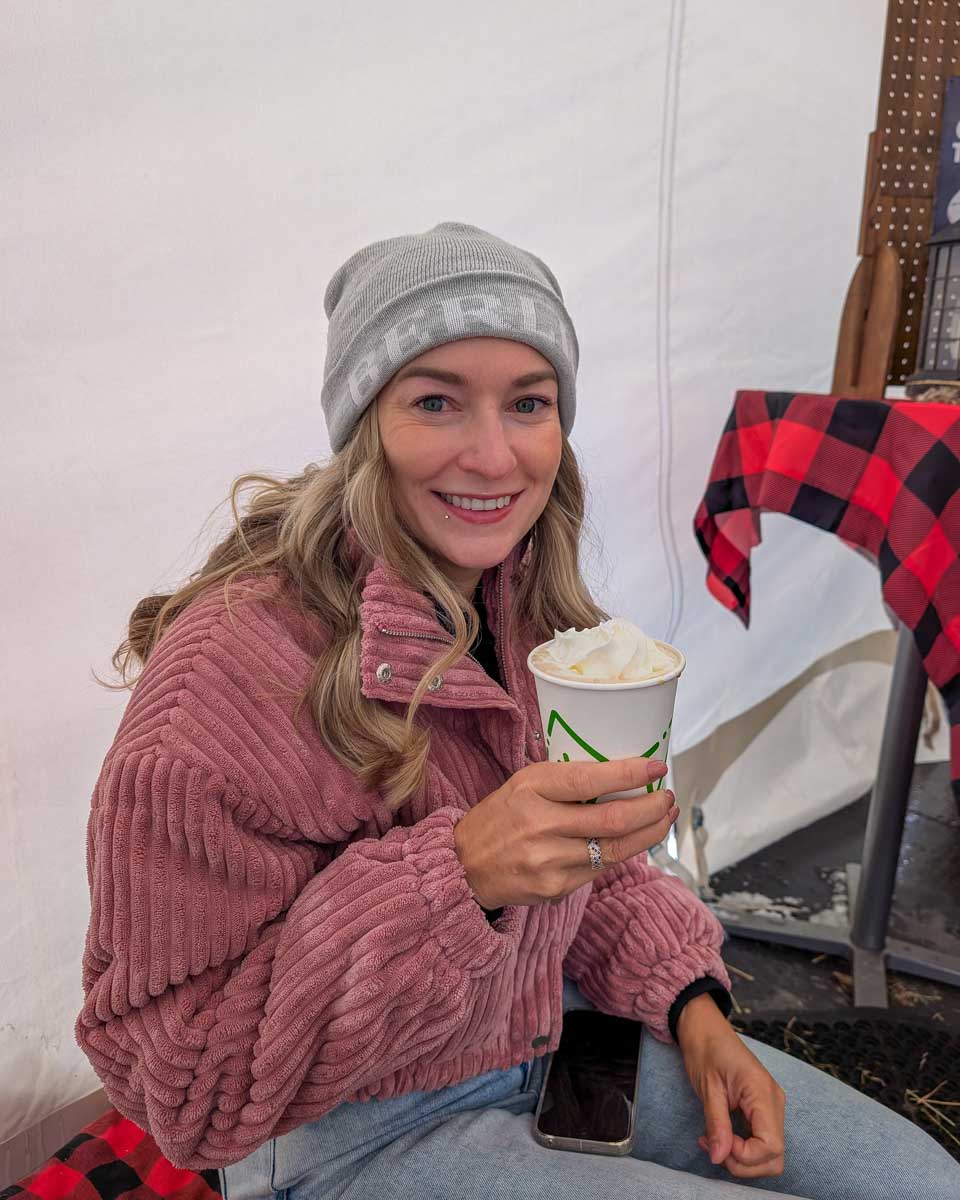 Bailey holds hot chocolate at the christmas market in Banff Alberta Canada Winter (23)