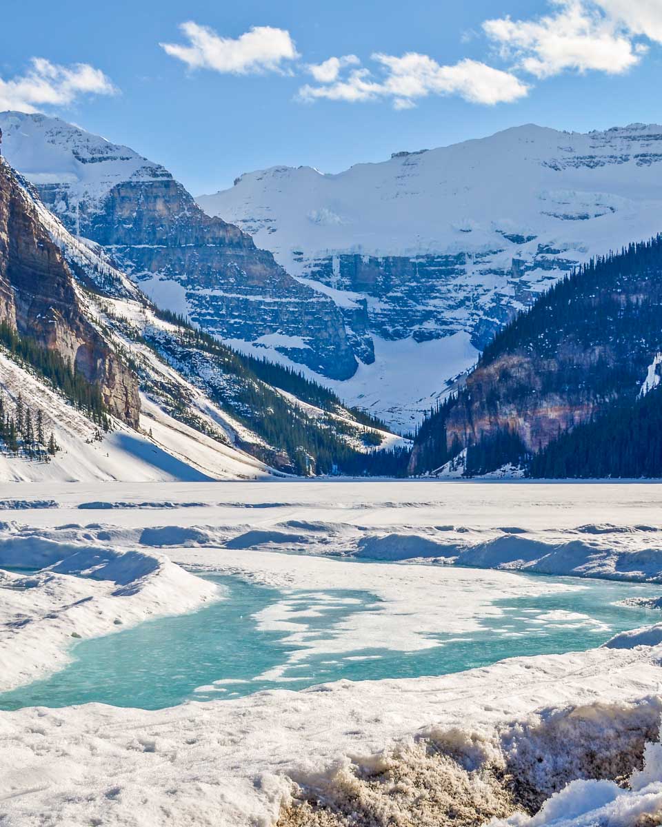 Lake Louise frozen in winter with a mountain backdrop