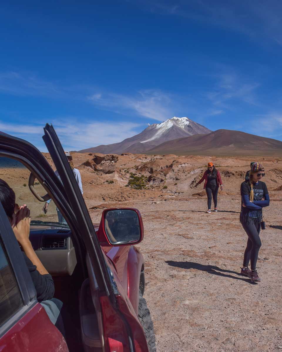 Tour group explores the Uyuni Salt Flat on a tour from La Paz
