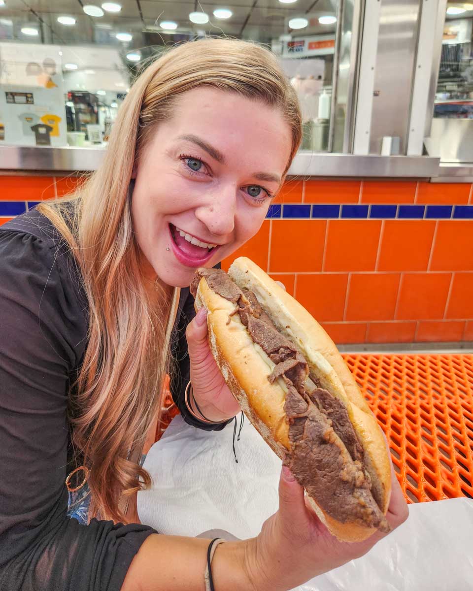 Bailey has a cheese steak from Genos in Philly