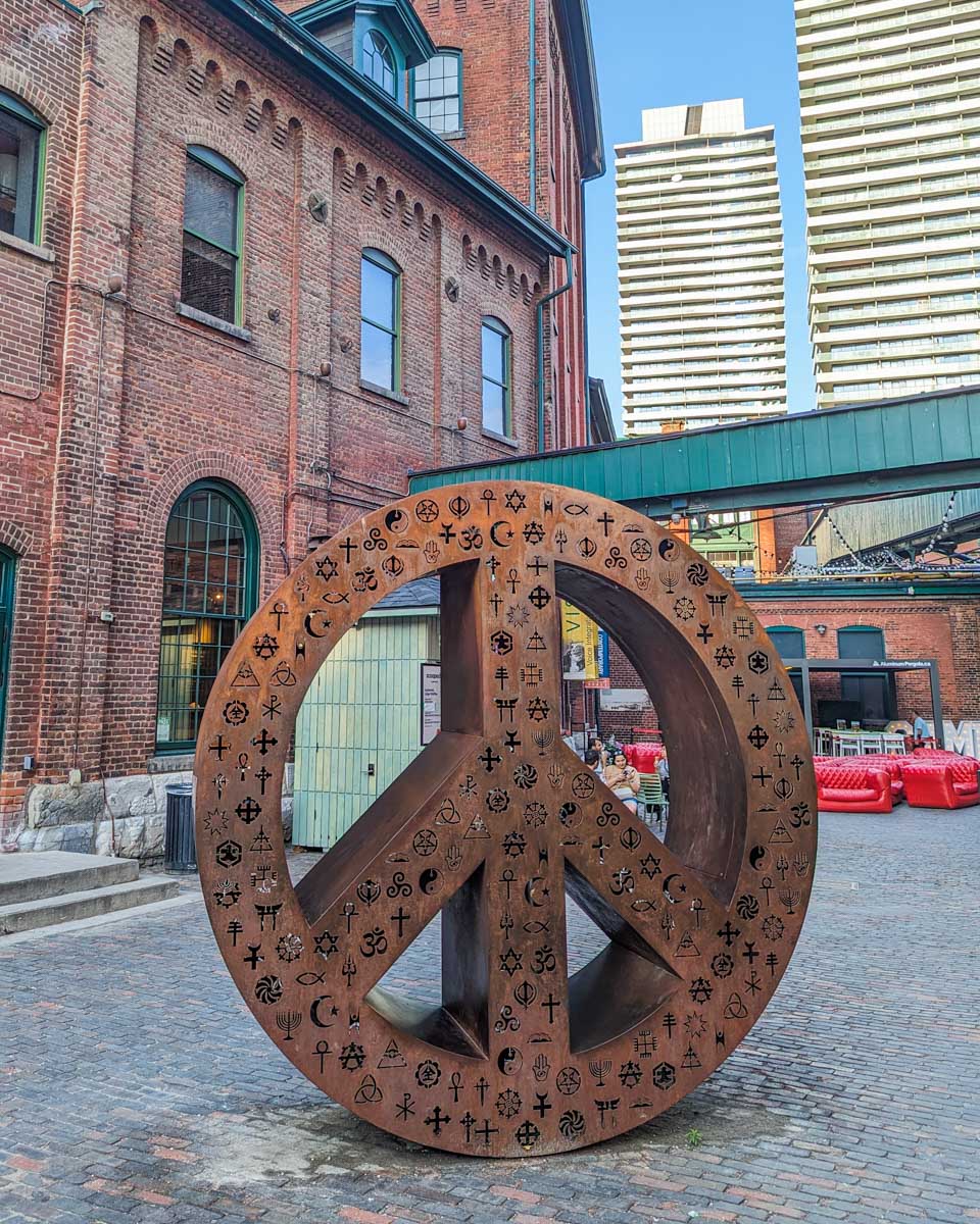 Peace sign sculpture inside the Toronto Distillery District